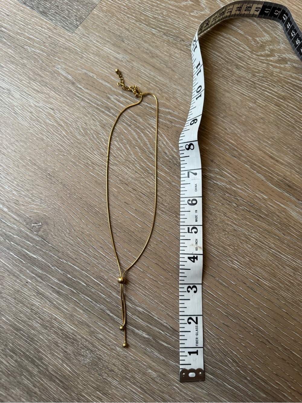 Gold tone thick chain lariat necklace